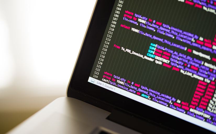 Laptop showing computer code